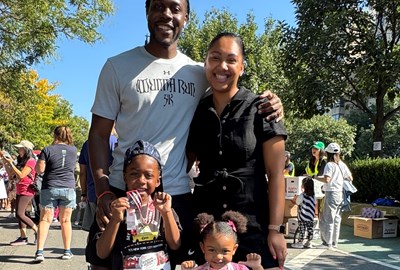 Rising NYRR dad Simon Obas and his family at the New Balance Bronx 10 Mile.